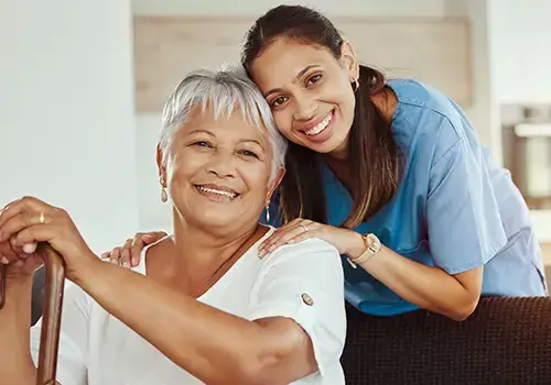 healthcare worker and patient smiling